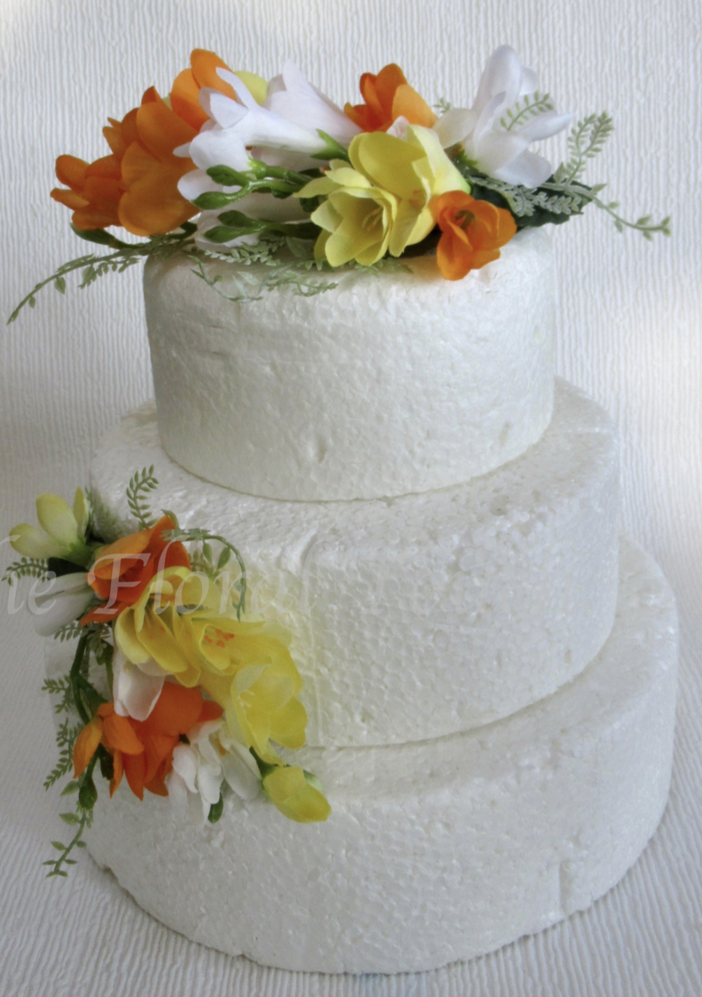 Orange, White & Yellow Freesia Cake Topper and Side Spray